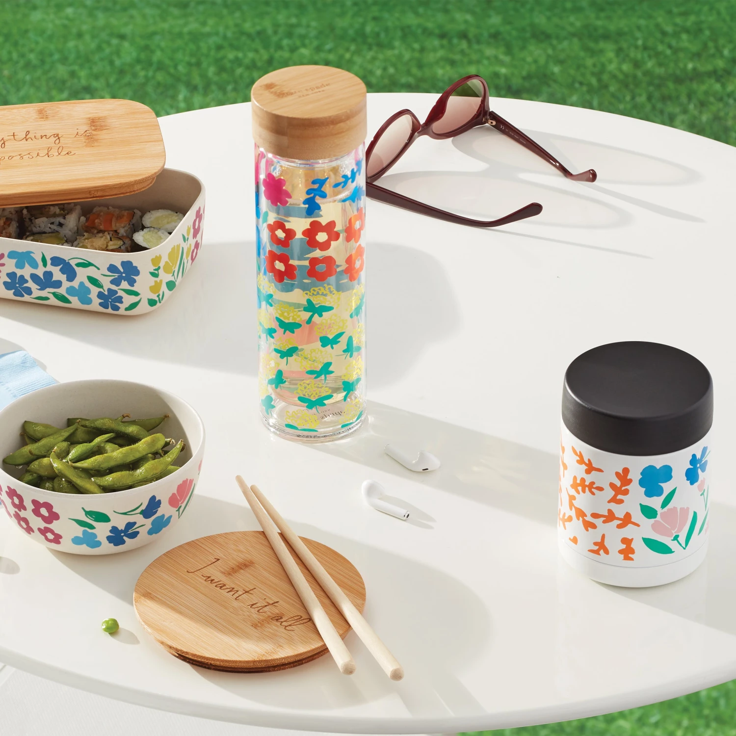 893968_w12_73e1d83e-dc7e-47cc-94ab-e6ec90a30a35.jpg Kate Spade Floral Fields Glass Hydration Bottle Under $50